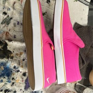 Nike slip on sneakers nwot just cleaning out the closet.